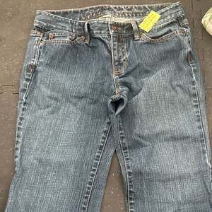 LOFT Women's Original Bootcut Mid Rise Jeans in Medium Wash